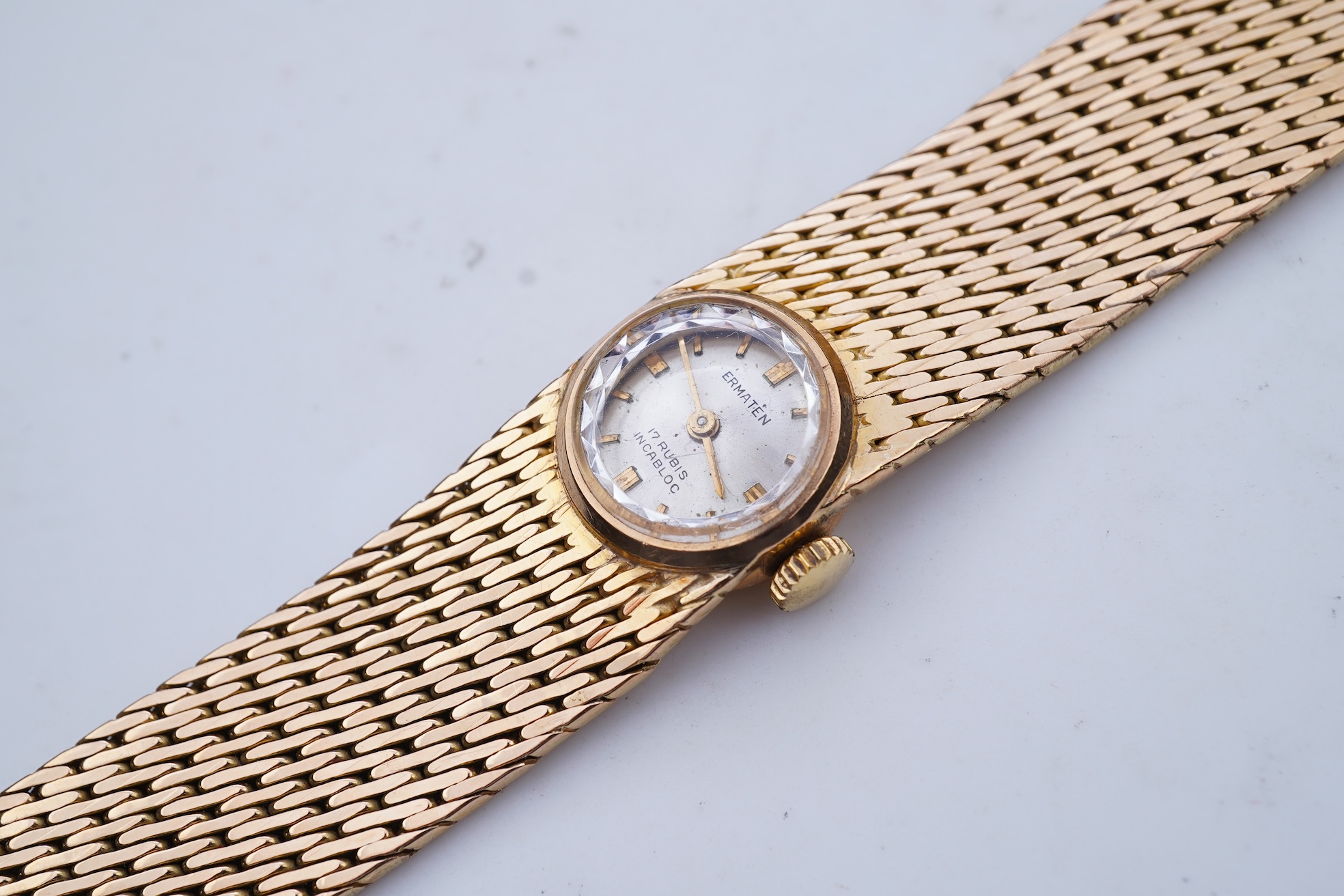 Ermaten, a gold watch